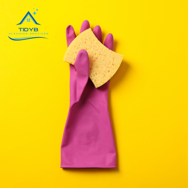 cleaning glove holding a sponge ready to scrub surfaces
